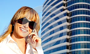 Beautiful young woman speaking the phone