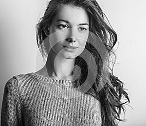 Beautiful young woman. Studio photo.