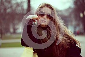 Beautiful young woman with sunglasses