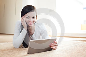 Beautiful young woman with tablet computer