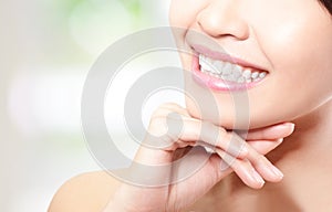 Beautiful young woman teeth close up