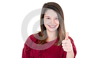 Beautiful young woman with thumb up