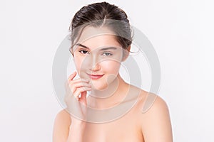 Beautiful Young Woman touching her clean face with fresh Healthy Skin, isolated on white background, Beauty Cosmetics and Facial