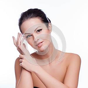 Beautiful Young Woman Touching Her Face.Fresh Healthy Skin