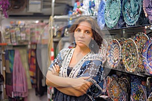 Beautiful young woman in a Turkish shop