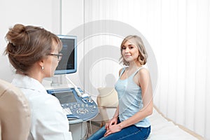 Beautiful young woman visiting doctor