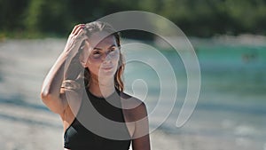 Beautiful young woman walk tropical beach