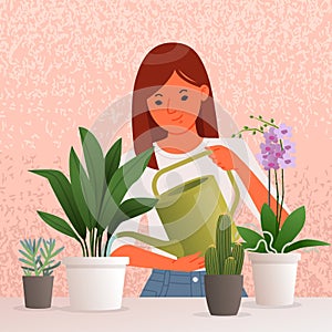 Beautiful young woman watering houseplants. Caring for indoor plants. Hobby