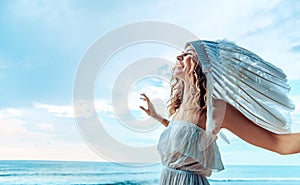 Beautiful young woman wearing a plume