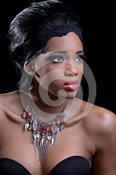 Beautiful young woman wearing stylish necklace