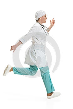 Beautiful young woman in white coat posing at studio. Full length studio shot isolated on white.