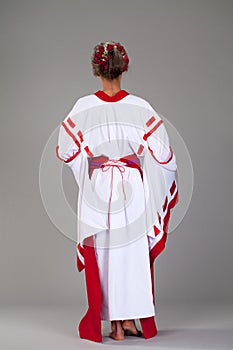 Beautiful young woman in white kimono