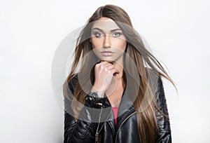 Beautiful young woman with wrist watch