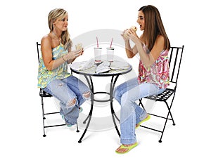 Beautiful Young Women Having Lunch Together