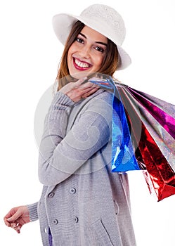 Beautiful young women holding her shopping bags