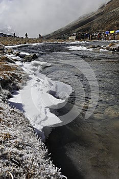 beautiful yumesodong valley or zero point. beautiful mountain river flowing through the valley and surrounded by himalaya