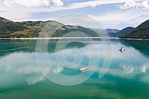 Beautiful Zlatar mountain lake with reflection, Serbia photo