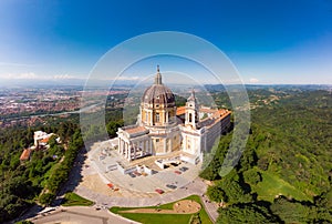 Beautifull aerial panoramic view to the famous from the drone Basilica of Superga in sunny summer day. The cathedral church