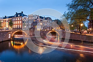 Beautifull Amsterdam canals with bridge and typical dutch houses