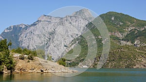 Mountains of Lake Komani in Albania photo