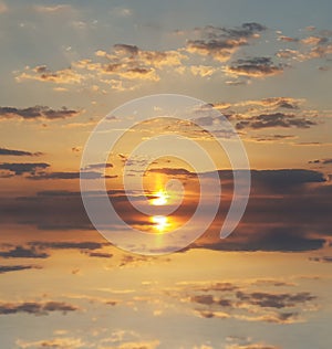 Beautifull sunset with clouds. Sunset on the river. Sunset on a water