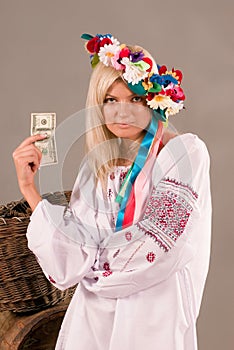 Beautifull ukrainian girl with dollar in her hand