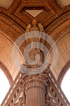 Beautifully carved arches and an angel sculpture in the Palace of Fine Arts, San Francisco