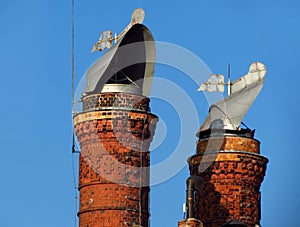 beautifully decorated brick chimneys photo