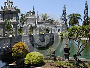 Beautifully decorated bridge at Ujung water temple Bali Indonesia photo
