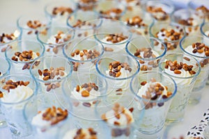 Beautifully decorated catering banquet table with different food snacks and appetizers on corporate christmas birthday party event