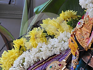 Beautifully decorated goddess Vara Mahalakshmi statue during festival at home photo