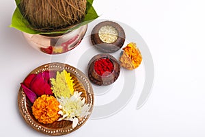 Beautifully Decorated Pooja Thali for festival celebration to worship  rice grain and kumkum  flowers  hindu puja thali