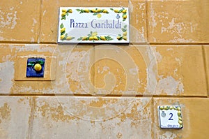 beautifully decorated street sign at Limone sul Garda photo