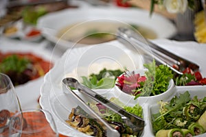 Beautifully decorated table, covered with different cuts.