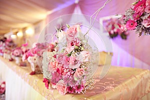 Beautifully decorated wedding table with flowers