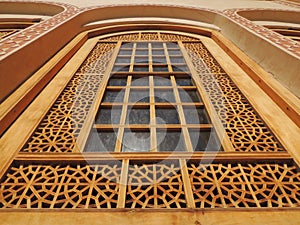 Beautifully decorated window with Muslim art wood carving