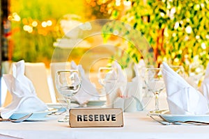 Beautifully laid for supper table with sign reserved