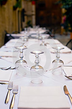 Beautifully laid table in a quiet cozy street of the city