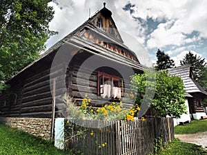 Beautifully old wooden houses in beautiful nature full of trees and flowers.Slovakia