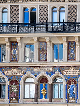 The beautifully renovated facade of the House of the Golden Cup, Vienna, Austria photo