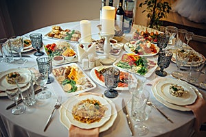 Beautifully served banquet table with a variety of snacks at corporate dinner, birthday party, Christmas party or wedding