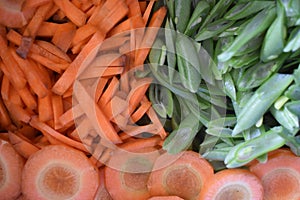 Beautifully sliced ??carrots, green beans and cabbage to make traditional Indonesian food, namely bakwan