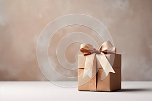 Beautifully wrapped gift box adorned with bow, set against the backdrop of twinkling Christmas lights New Year holiday.