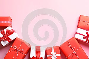 Beautifully wrapped gift boxes on color background