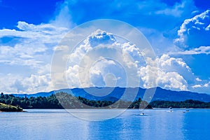 Beautifulo outdoor view of Guatape lake in a gorgeous blue sky in Colombia