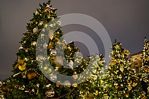 Beautifuly decorated Christmas tree in the city at night photo