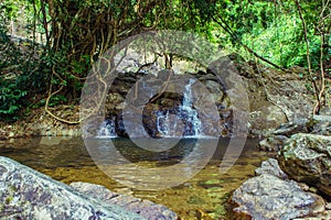 Beautify of medium waterfall around stones and forest at Khao Yai National Park - Nakhon Nayok Province, Thailand.