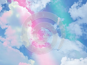 beauty abstract sweet pastel soft blue and pink with fluffy clouds on sky. multi color rainbow image. fantasy growing light