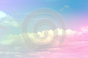 Beauty abstract sweet pastel soft pink and blue with fluffy clouds on sky. multi color rainbow image. fantasy growing light