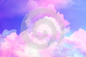 Beauty abstract sweet pastel soft pink and blue with fluffy clouds on sky. multi color rainbow image. fantasy growing light